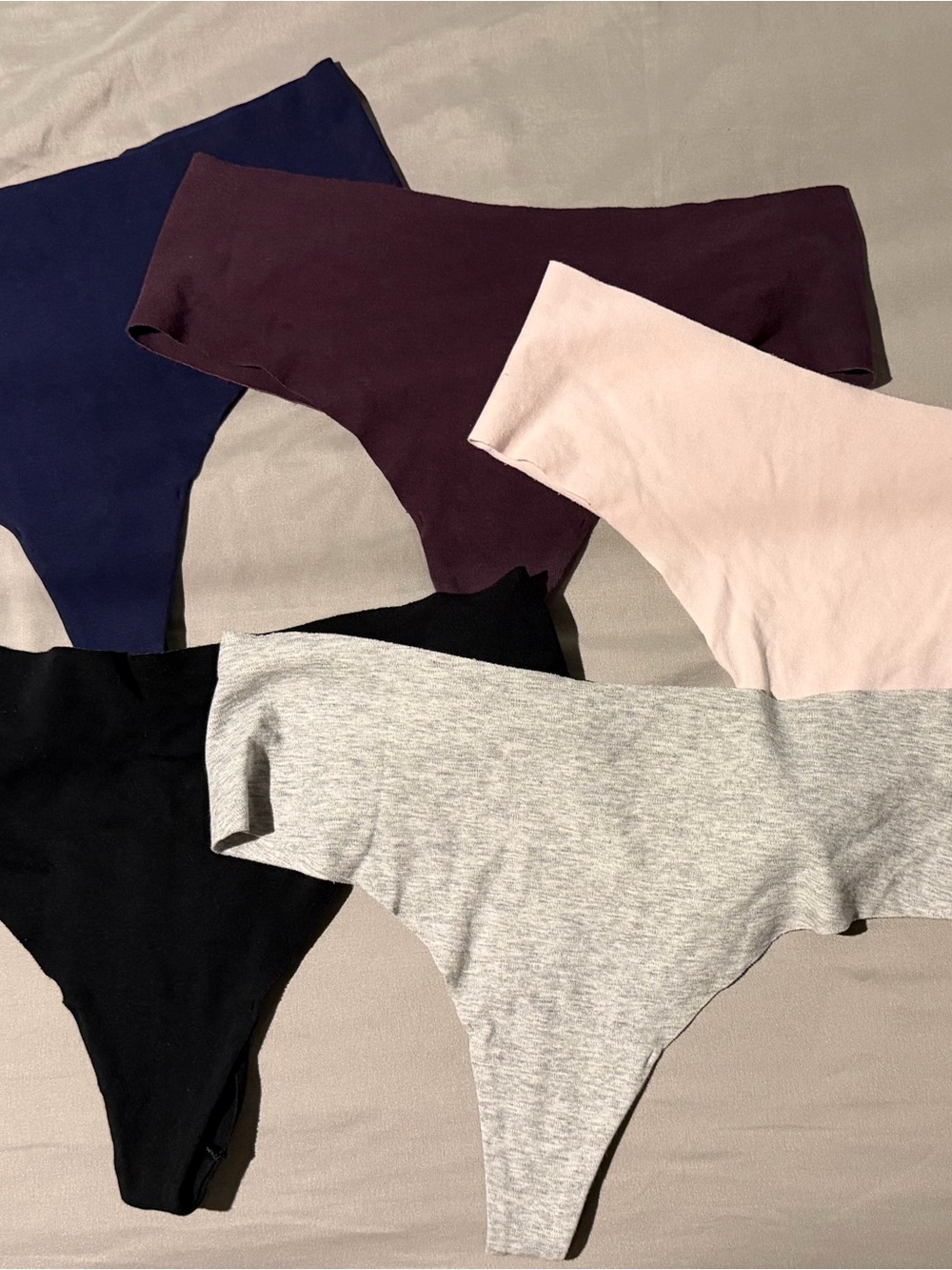 aerie Girls Five-Pack Seamless Thongs in Navy, Plum, Pink, Black & Gray
